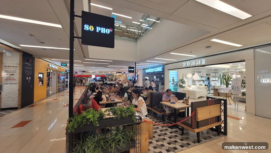 Food Court Interior with Dining Area and Storefronts