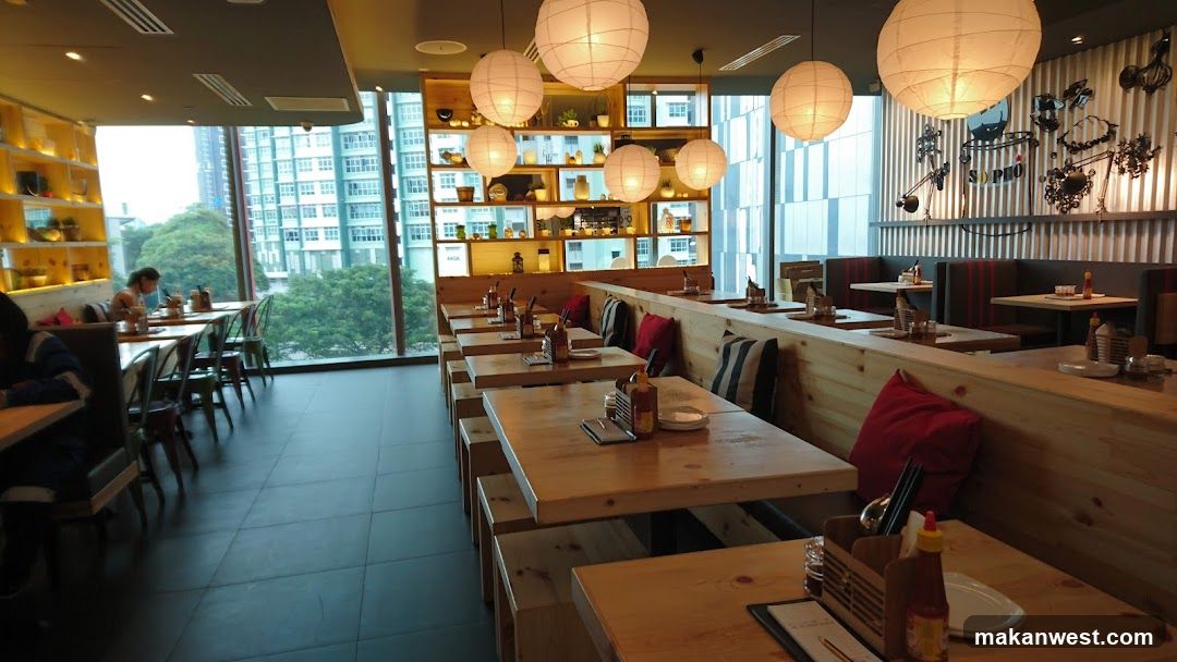 Restaurant Interior with Wooden Tables and Large Windows