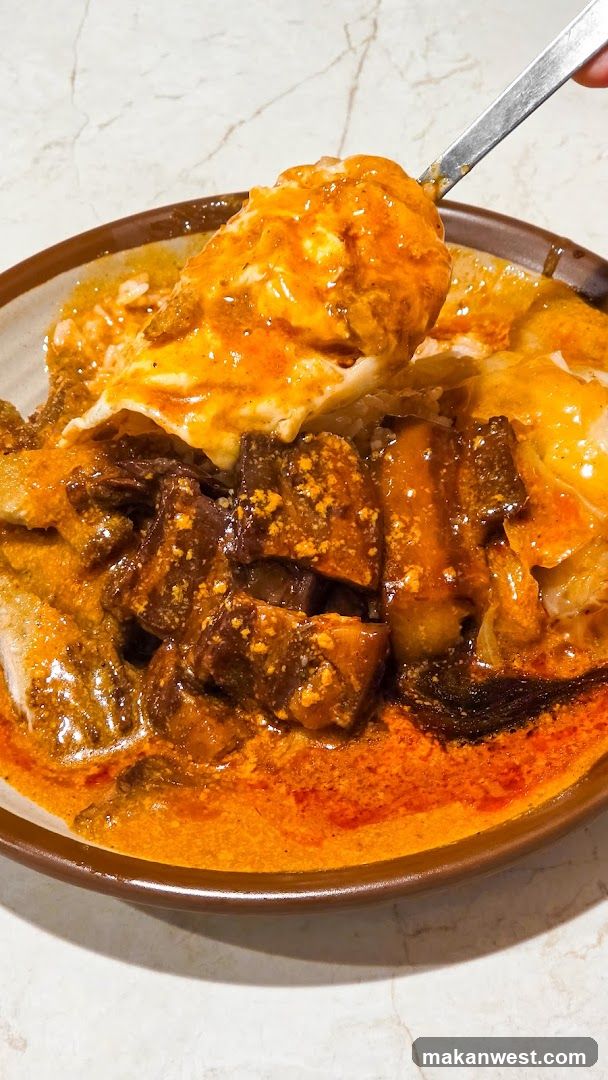 Spicy Curry Dish with Spoon