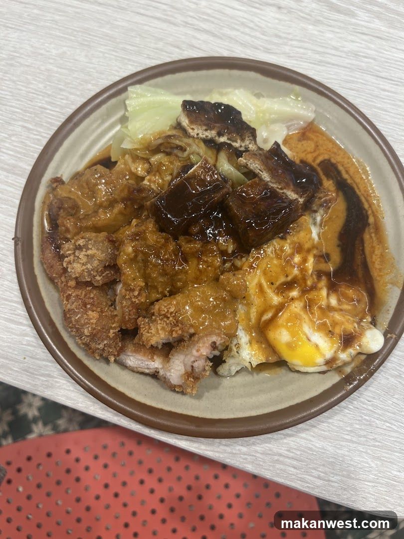 Bowl of Fried Chicken with Sauce and Egg