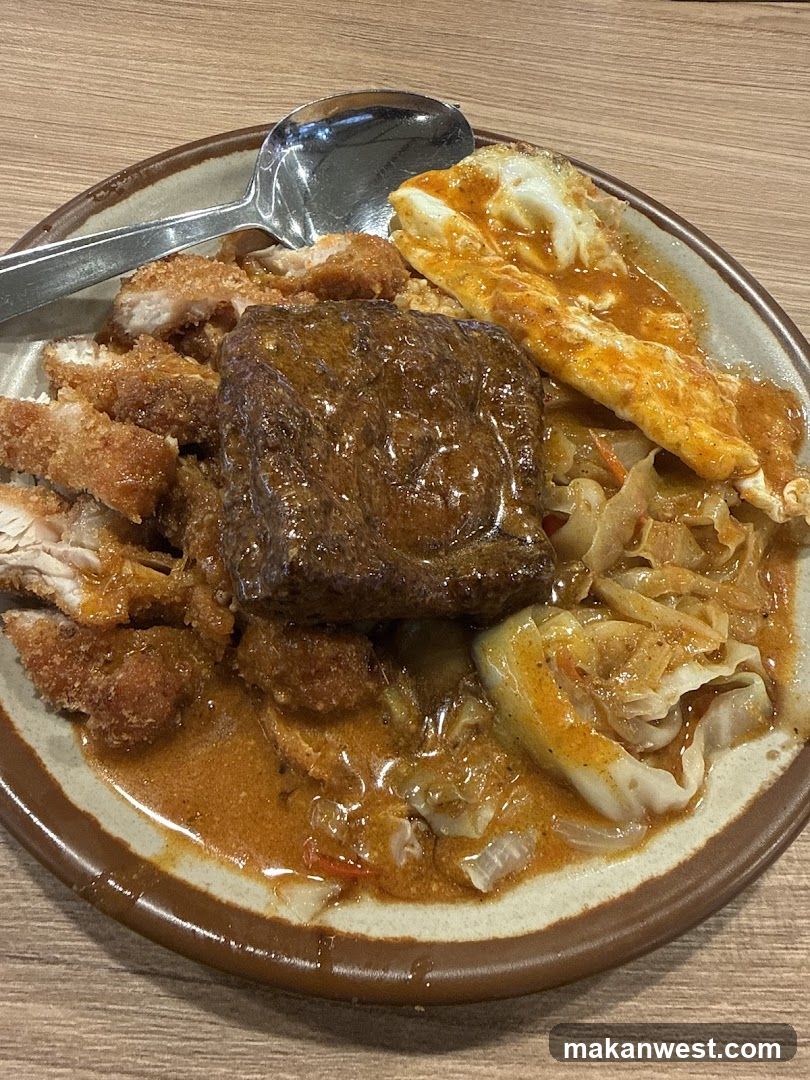 Curry Rice Bowl with Fried Egg and Pork Cutlet