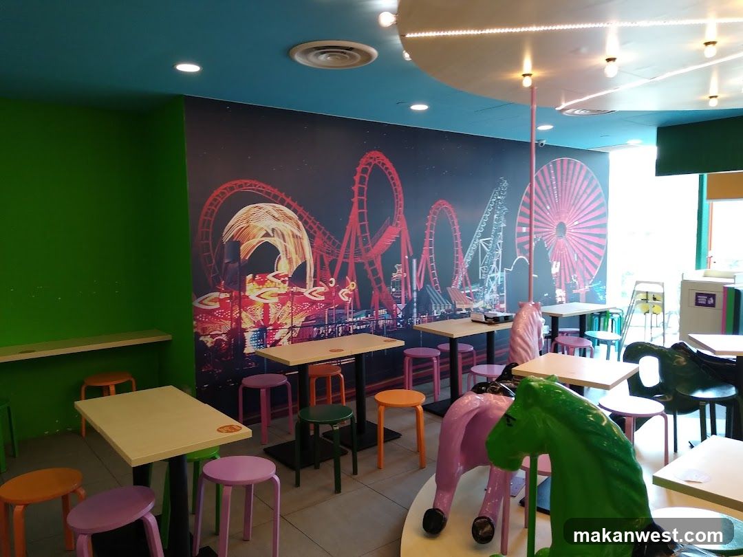 Colorful Restaurant Interior with Rollercoaster Wall Art
