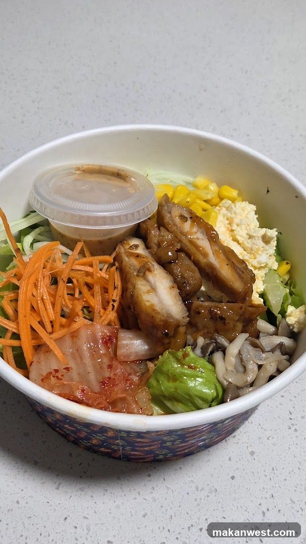 Bowl of Korean-style food with sauce