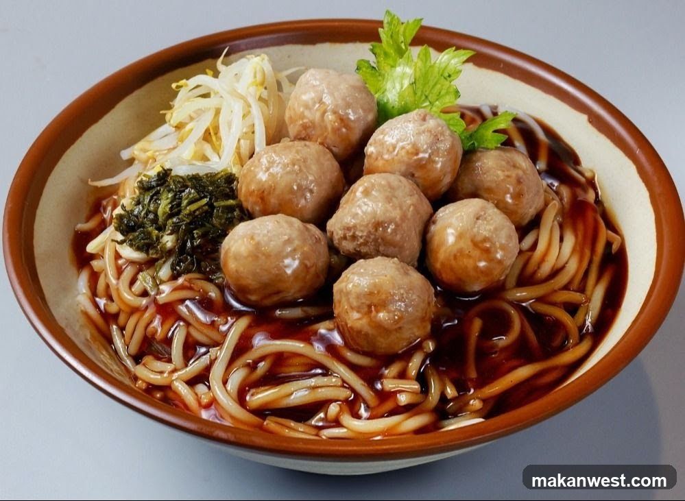 Bowl of Noodles with Meatballs and Toppings