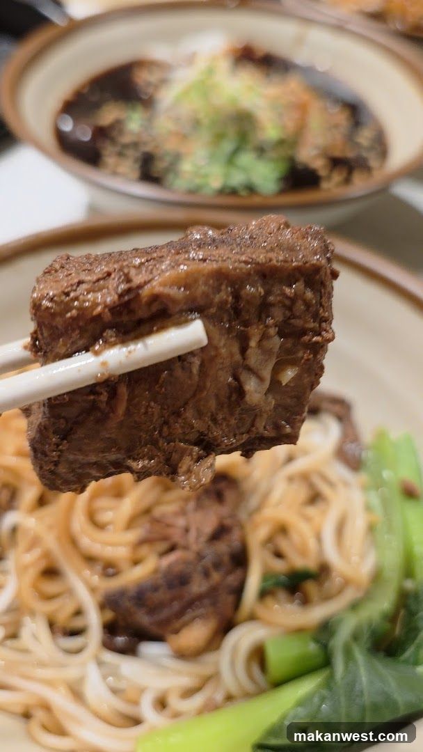 Beef Noodle Dish with Chopsticks