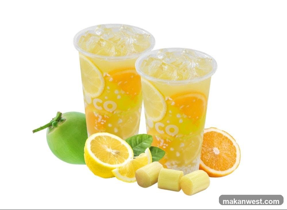 Fruit-infused beverage cups with fresh ingredients