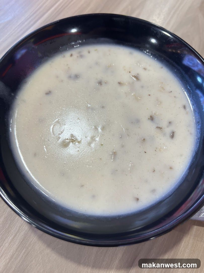 Bowl of creamy soup with mushrooms