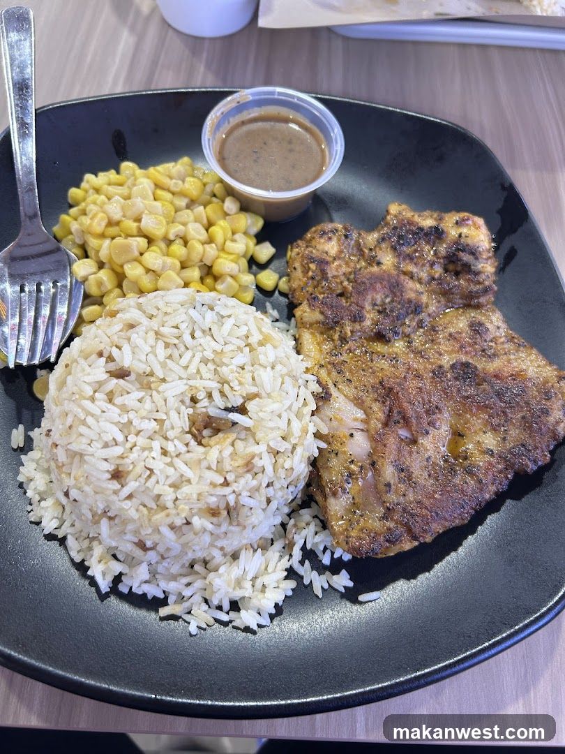 Plate of Fried Rice with Corn and Grilled Meat