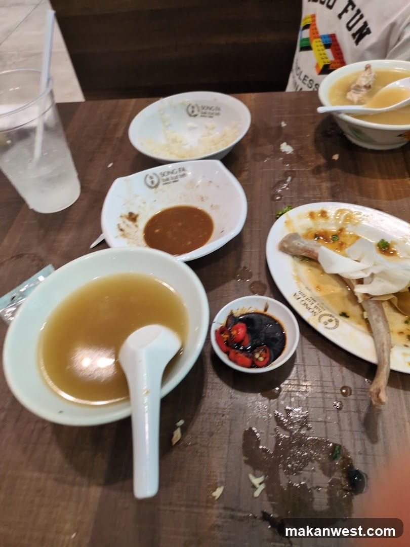 Used Table with Remains of a Meal