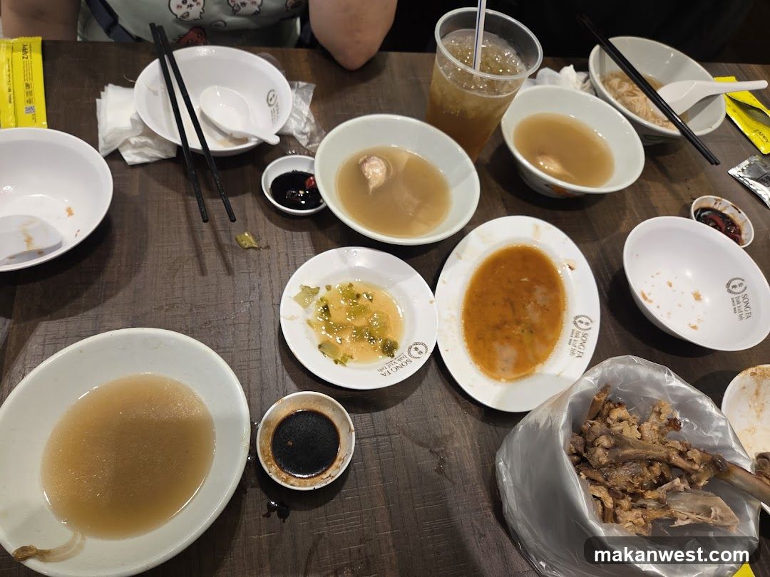 Used Tableware with Soup Bowls and Condiments