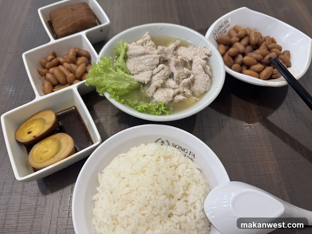Bowl of meat soup with rice and side dishes