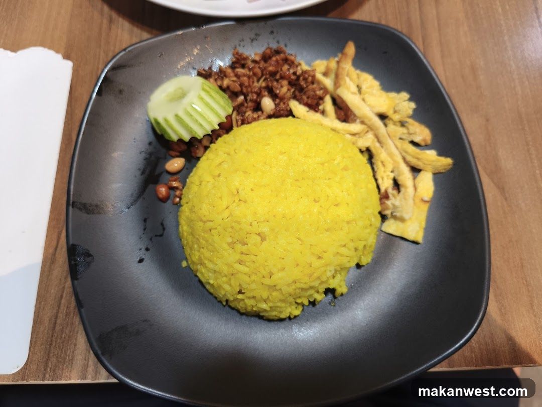 Yellow Rice Dish with Fried Egg and Minced Meat