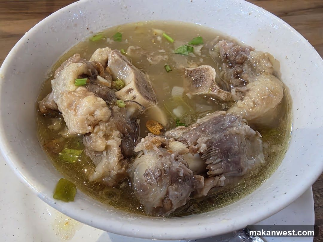 Bowl of Bone Soup with Green Onions