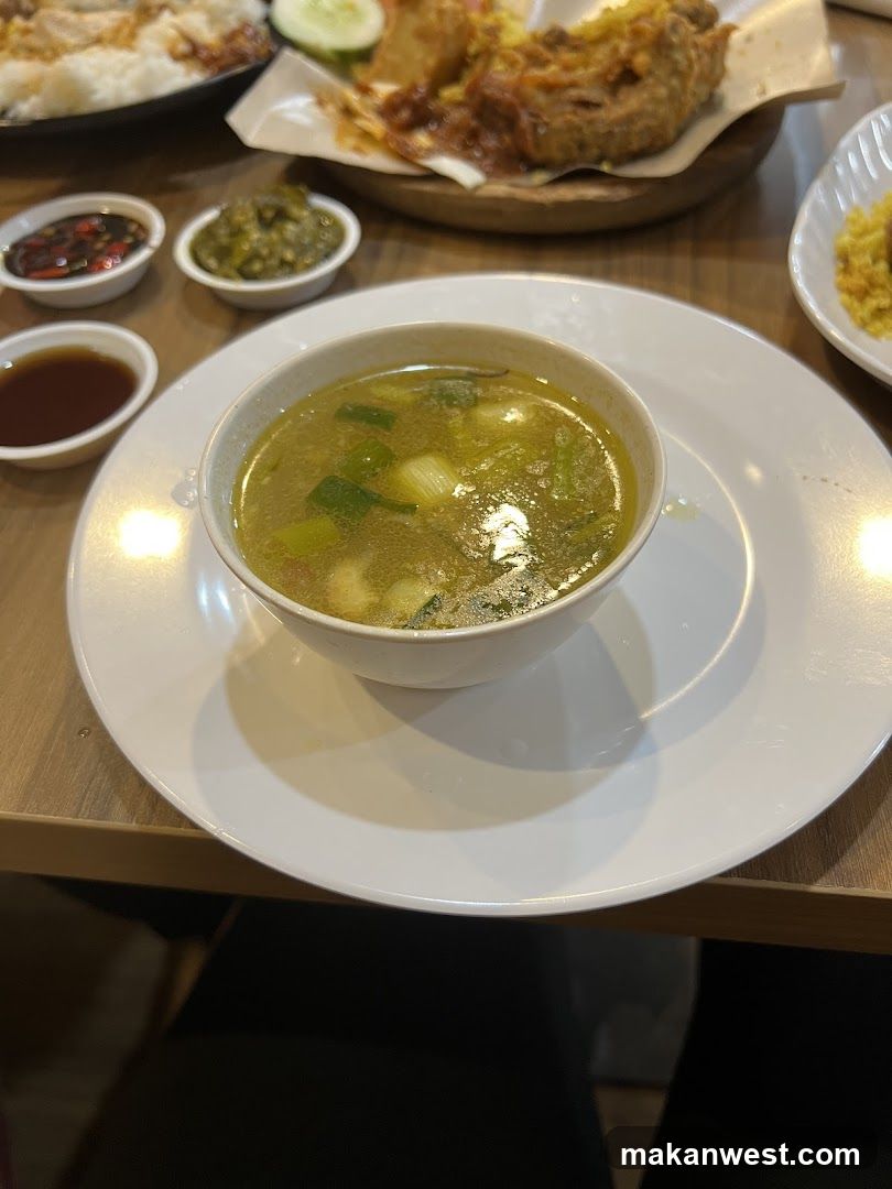 Bowl of Soup with Side Dishes