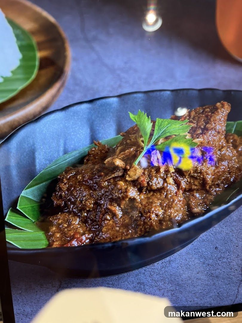Spicy Meat Dish with Edible Flowers
