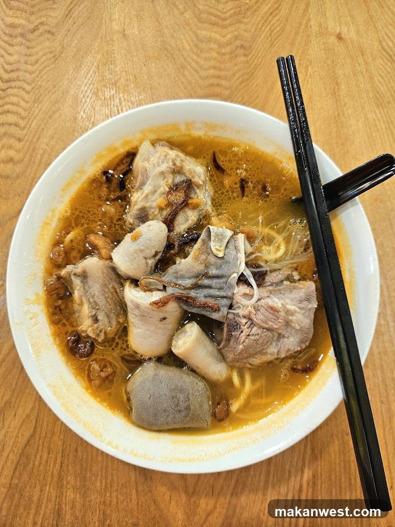Bowl of Noodle Soup with Meat and Vegetables