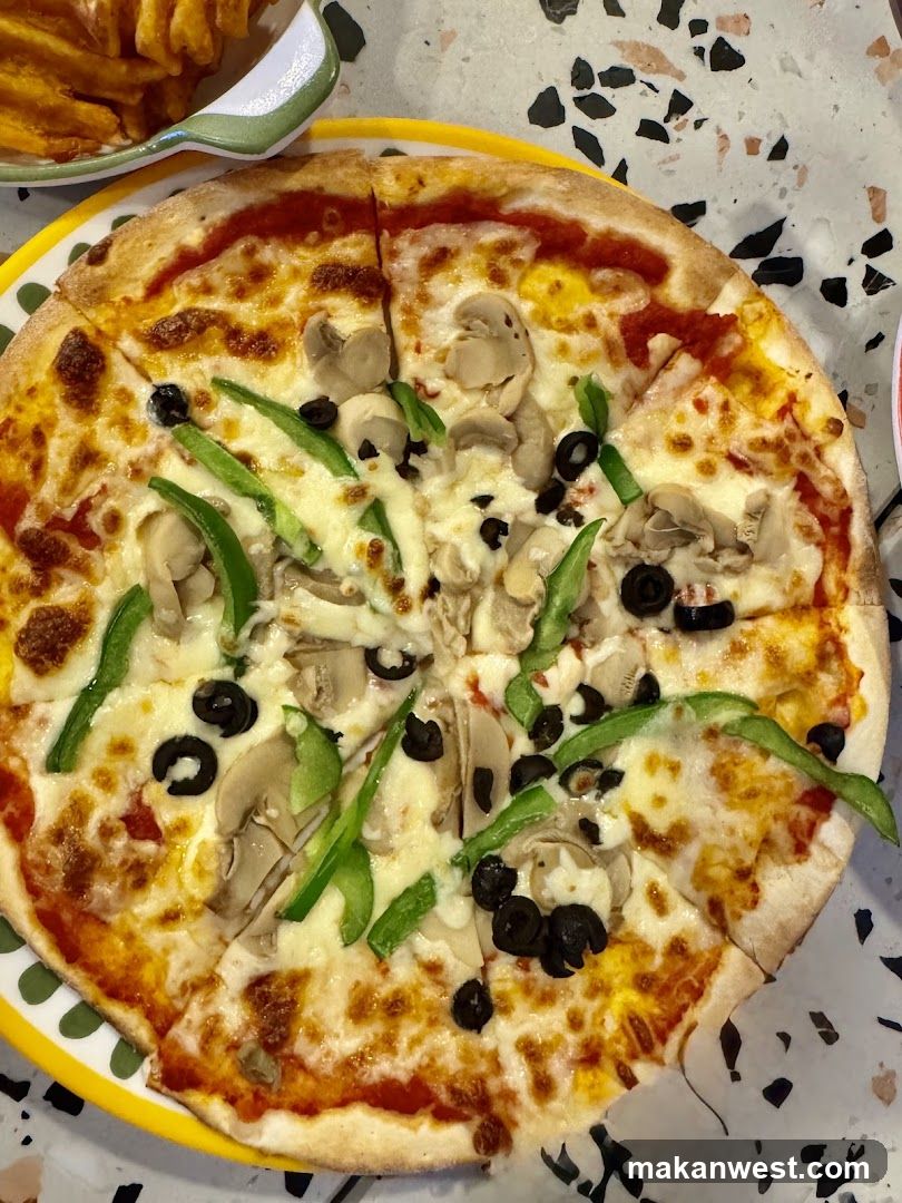 Pizza with Mushrooms, Peppers and Olives