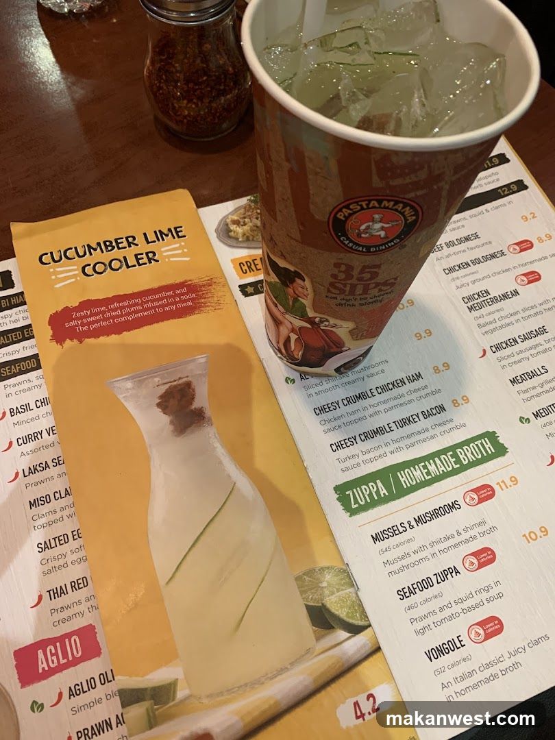 Restaurant Table Setting with Menu and Drink