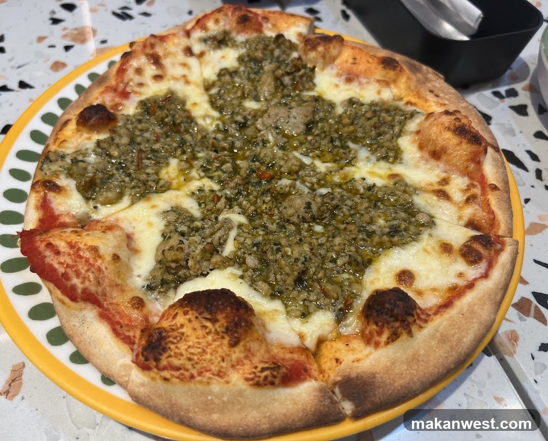 Pizza with pesto and cheese