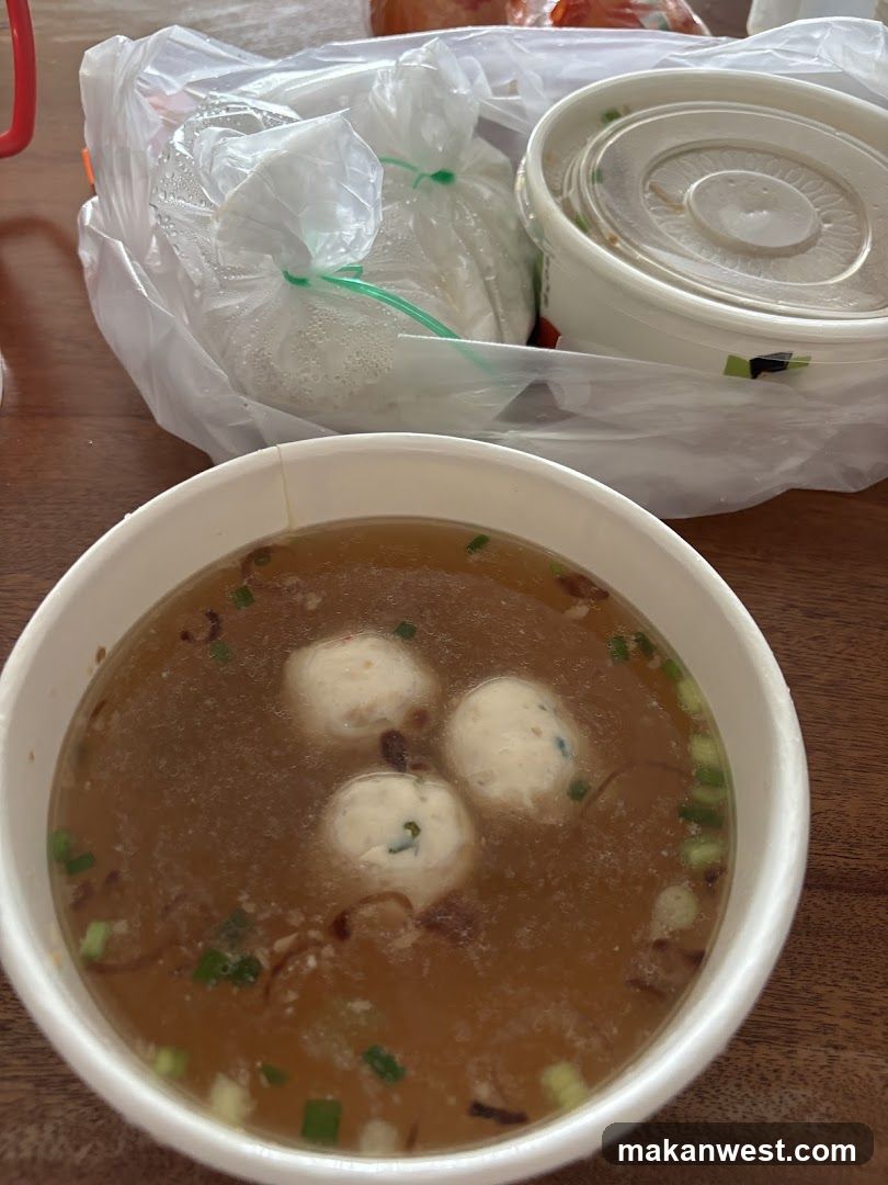 Bowl of Soup with Meatballs