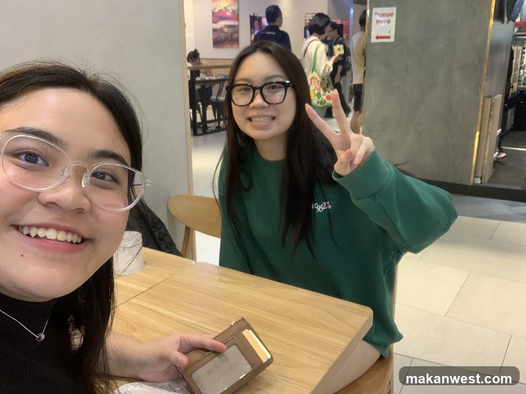 Two women at a cafe table