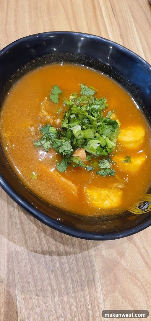 Bowl of Curry Soup with Garnish