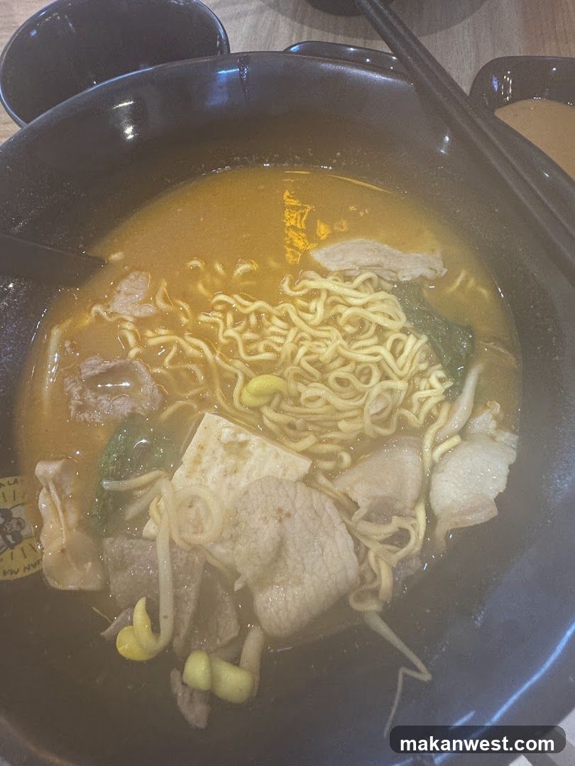 Bowl of Noodles with Broth and Tofu