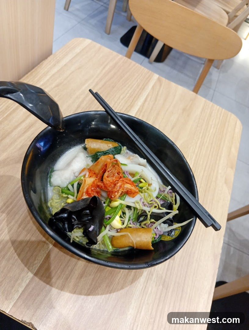 Bowl of Korean-style noodle soup with toppings