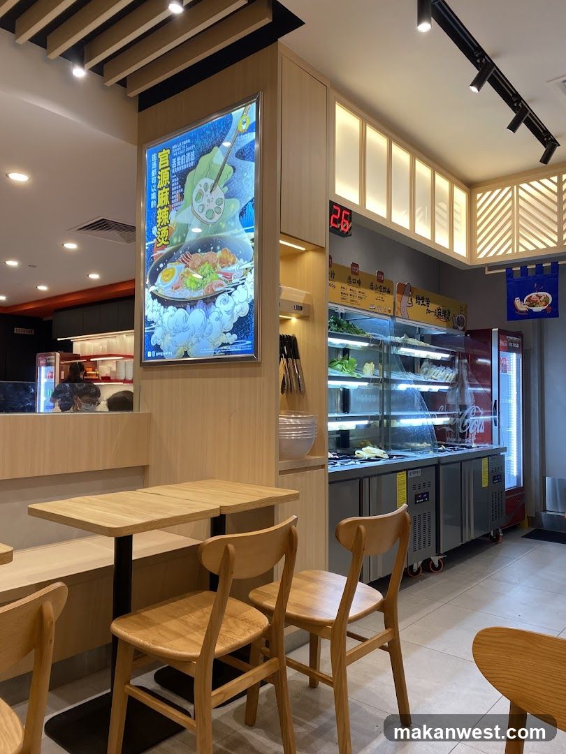 Restaurant Interior with Menu Display and Kitchen Area