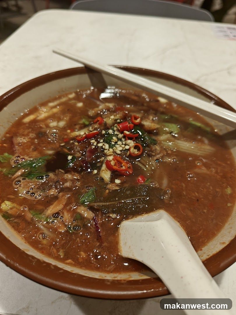 Spicy Noodle Bowl with Chili and Sesame Seeds