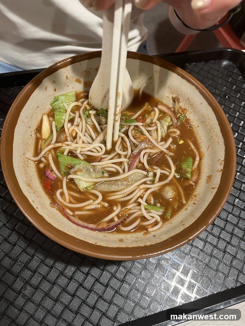 Bowl of Noodles with Chopsticks