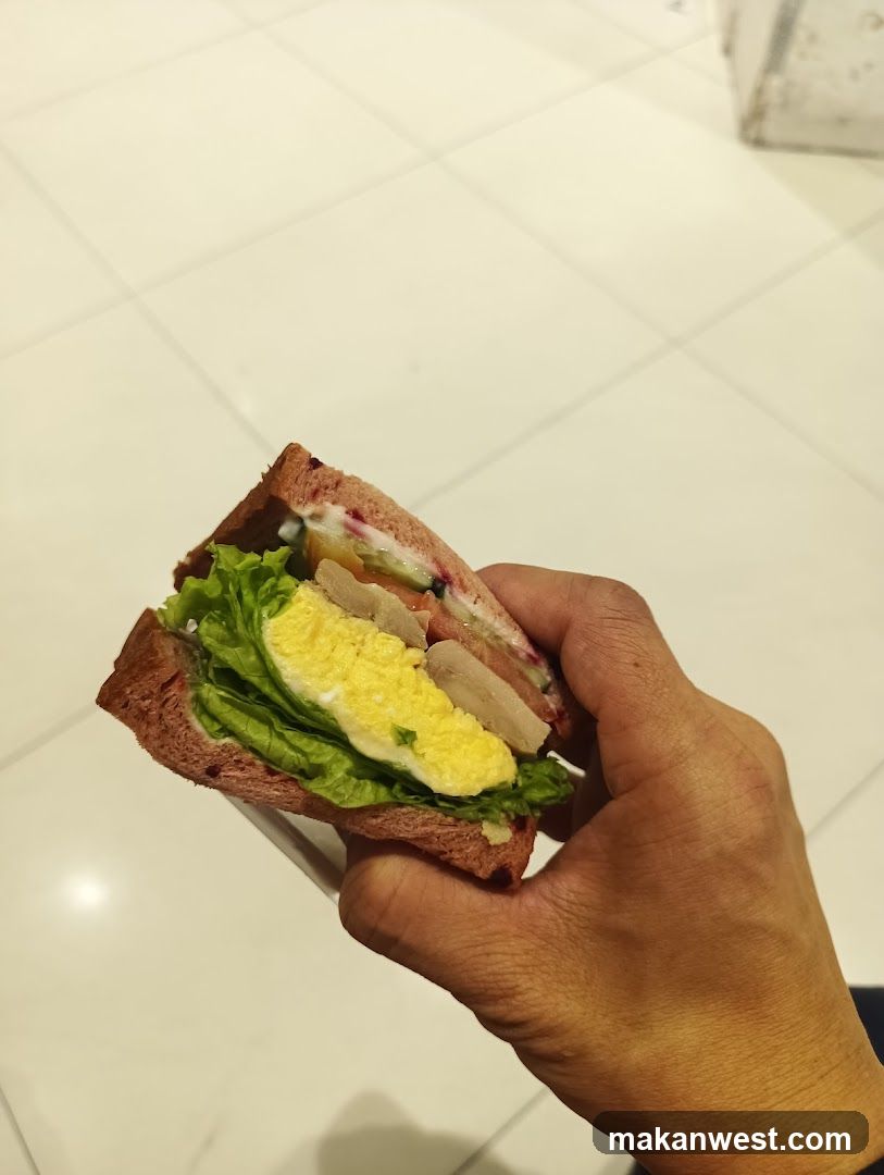 Handheld Sandwich with Egg and Lettuce
