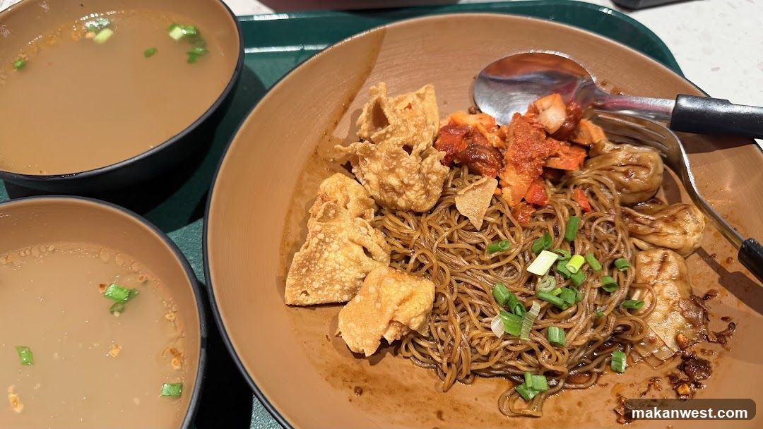 Noodle Dish with Broth and Side Bowls