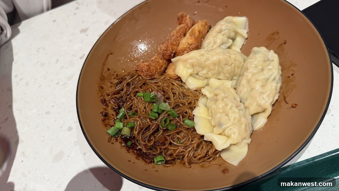 Bowl of noodles and dumplings