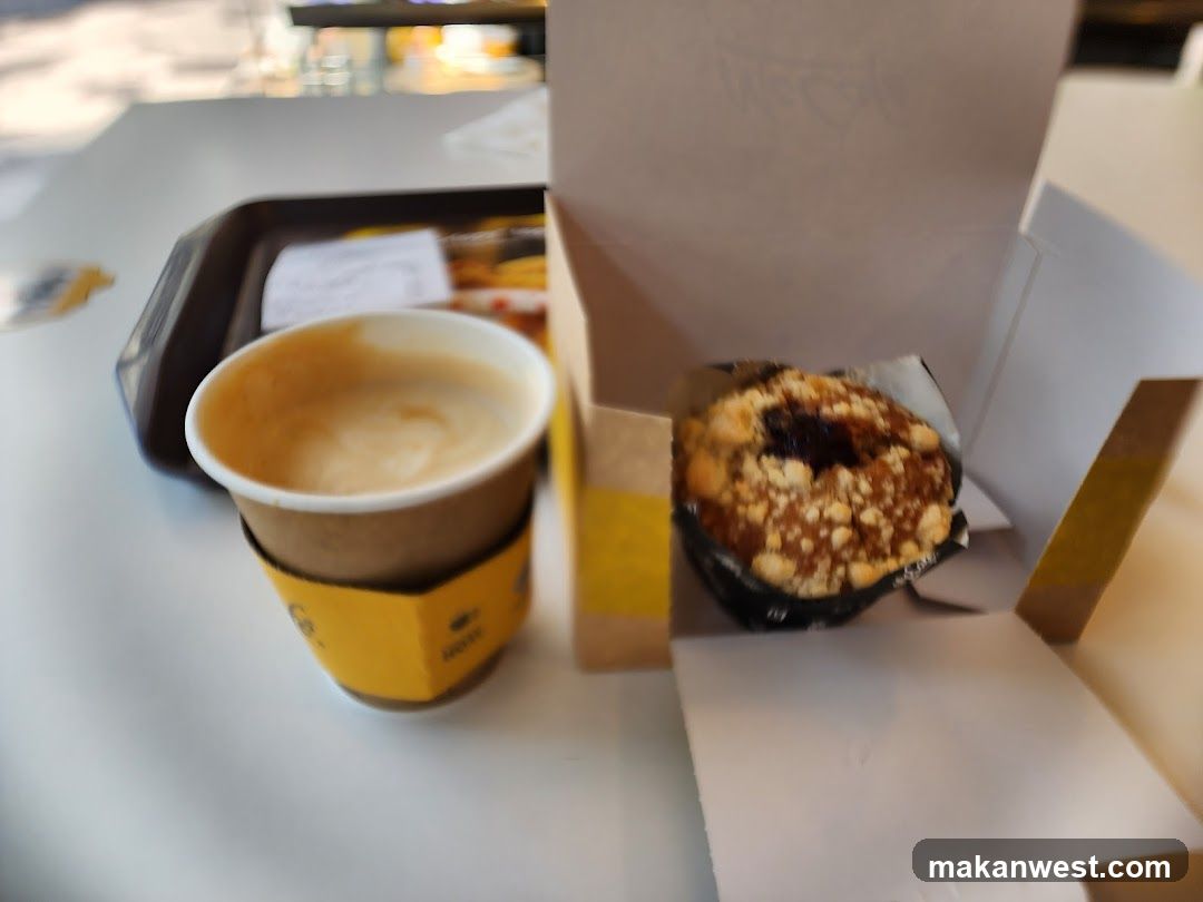 Coffee and Pastry on Table