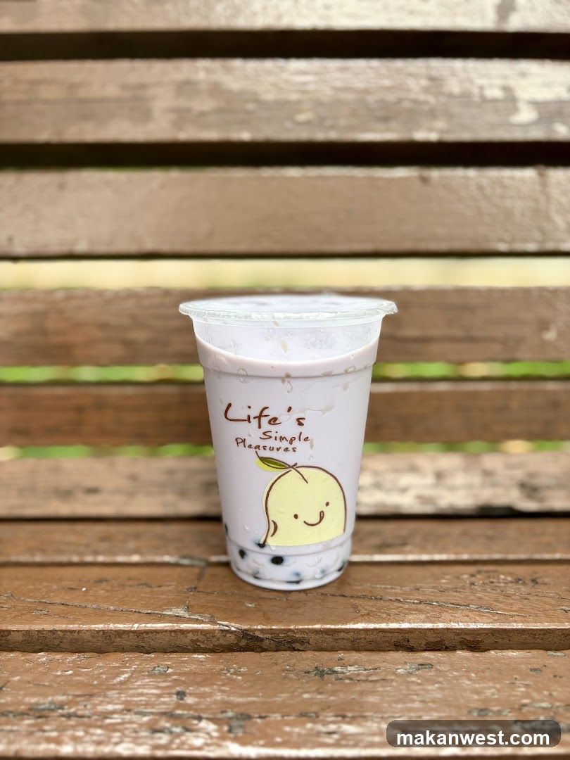 Boba Milk Tea Cup on Wooden Bench