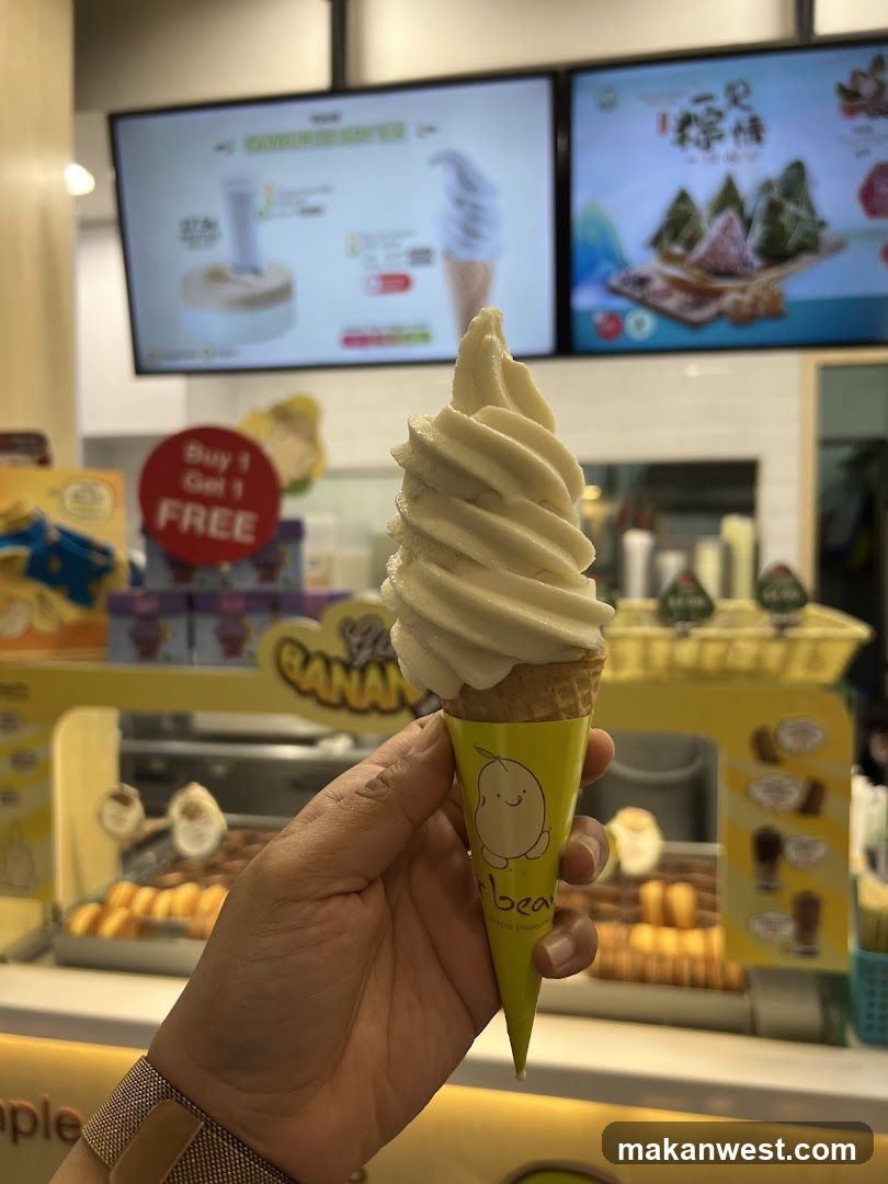 Soft-serve ice cream cone in a yellow cup