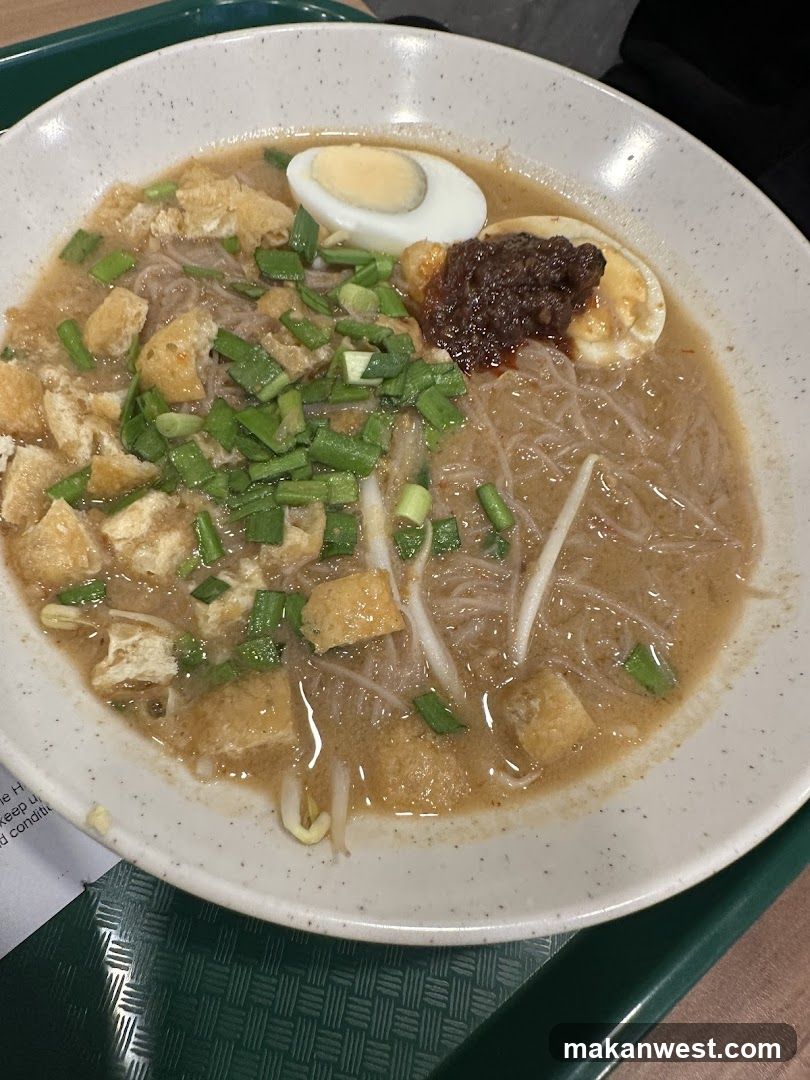 Bowl of Noodle Soup with Tofu and Egg