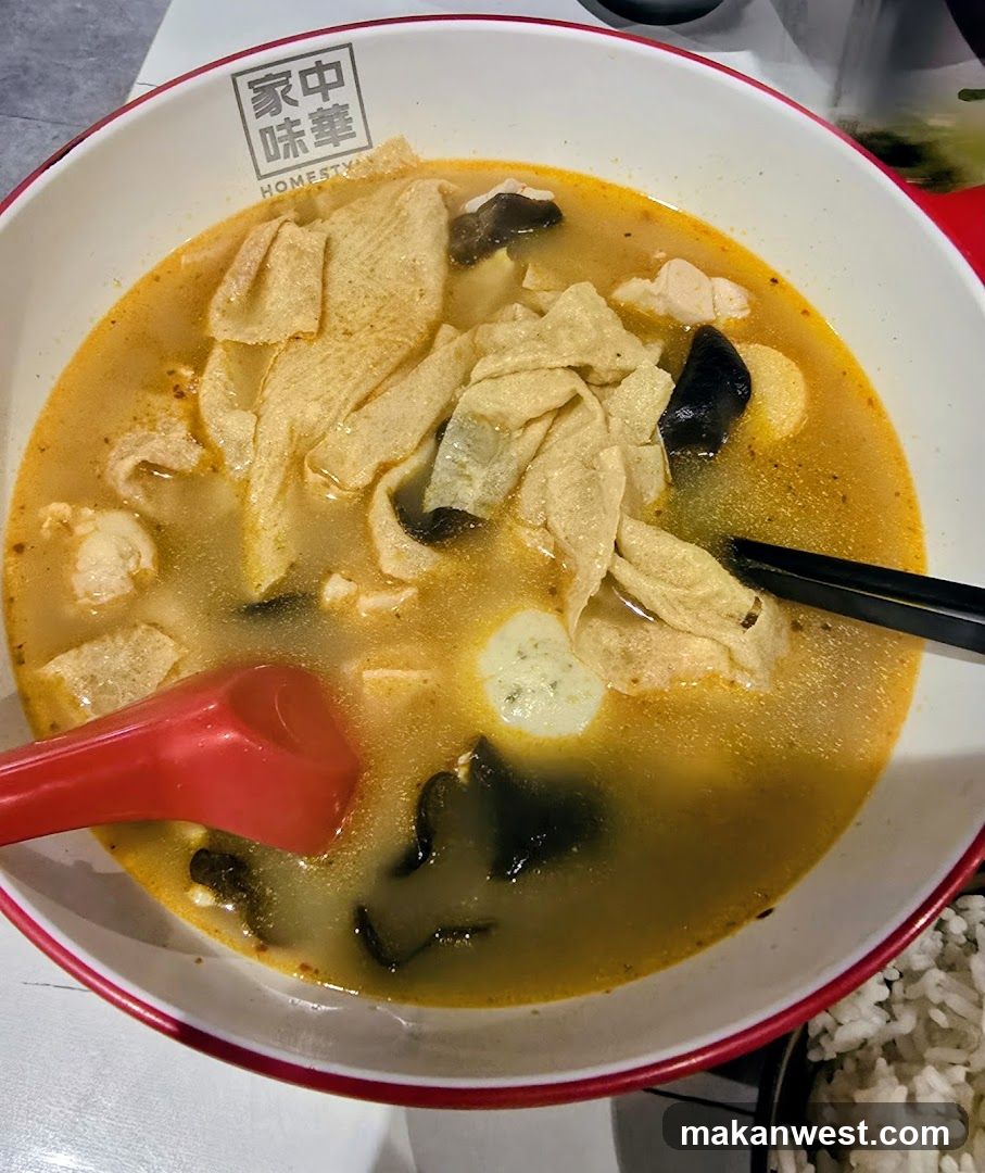 Bowl of Soup with Fish Cake and Tofu Skin