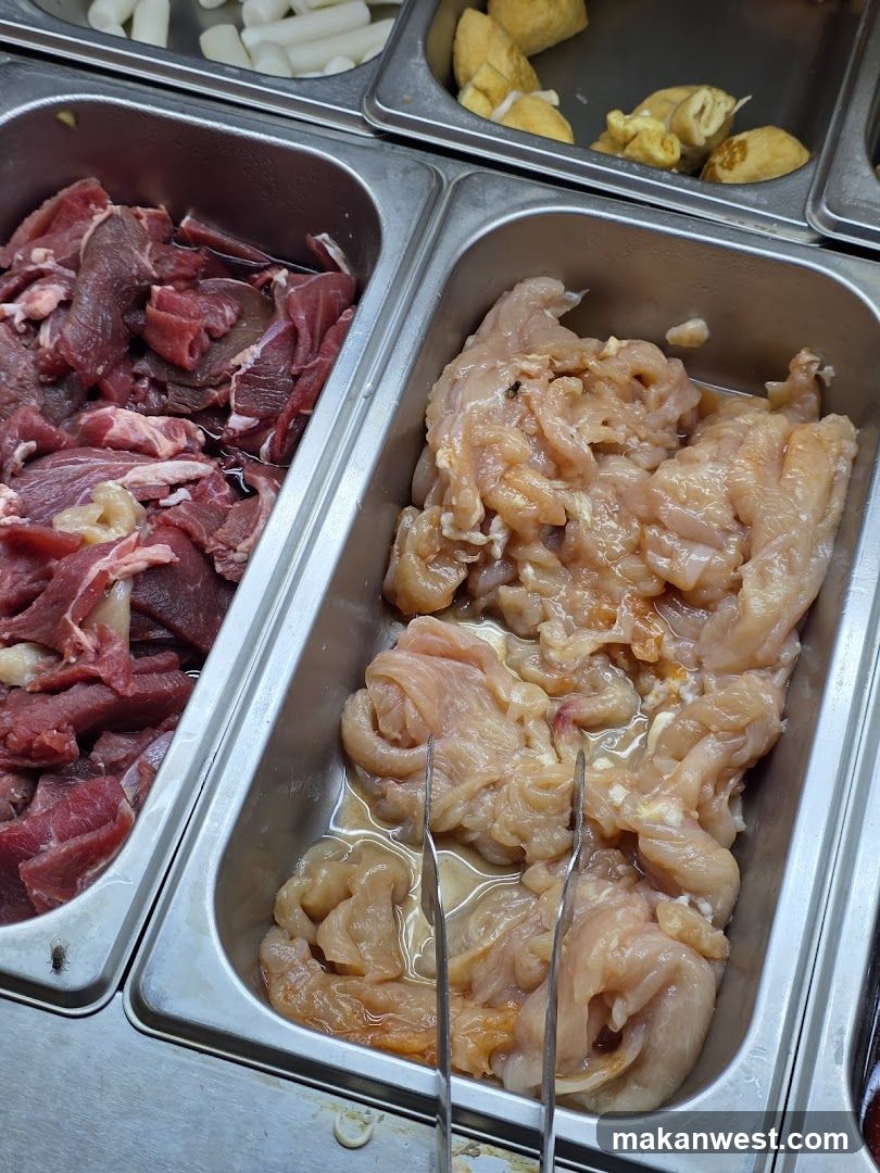 Raw Meat and Chicken in Metal Containers