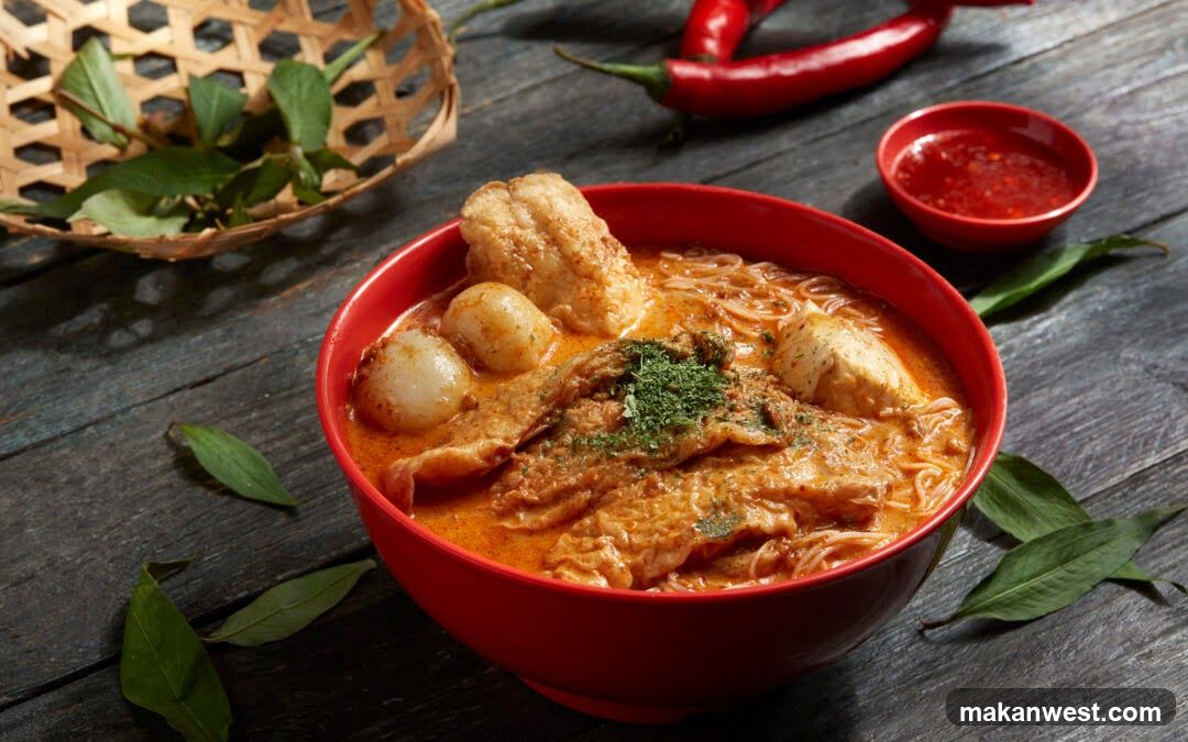 Red Curry Noodle Bowl with Fish Cake and Chili Sauce
