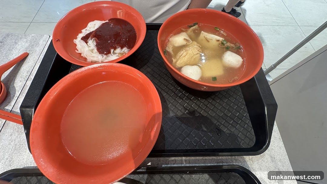 Food Tray with Bowls of Soup and Noodles