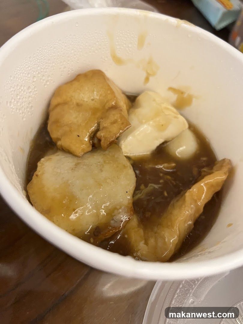 Bowl of Soup with Meat and Tofu