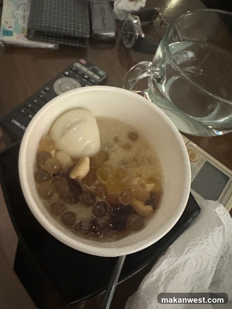 Bowl of dessert with boba and fruit