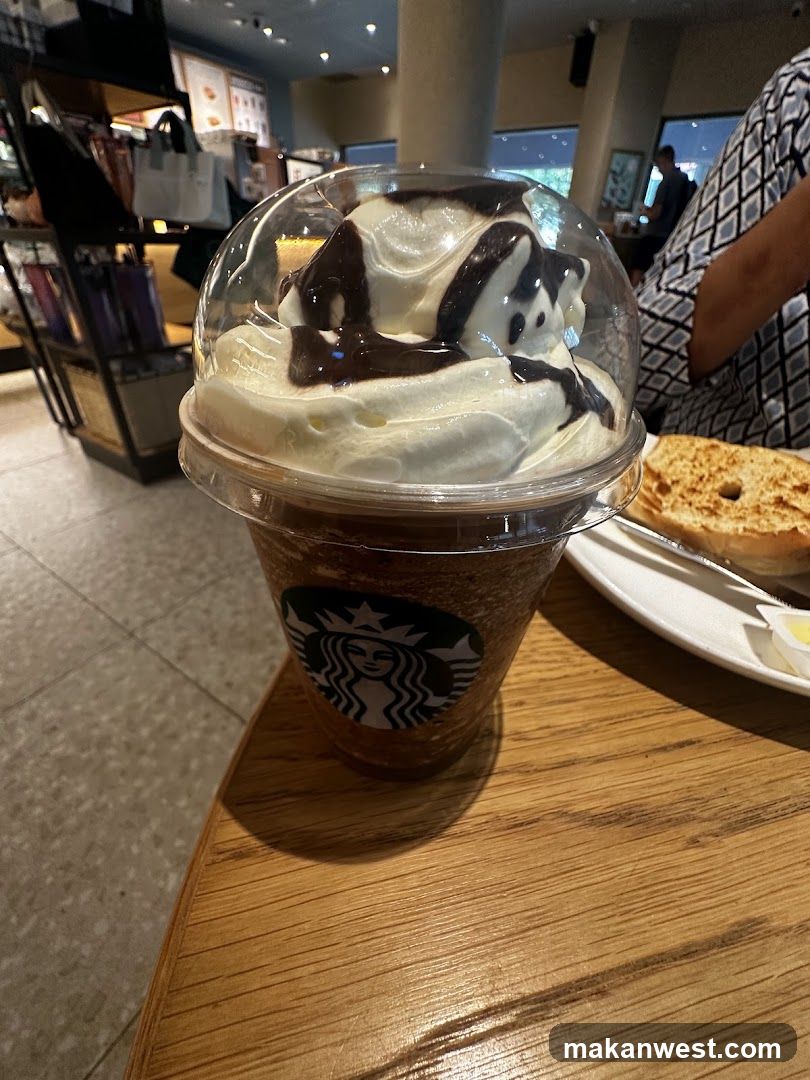 Starbucks Drink with Whipped Cream and Chocolate Drizzle