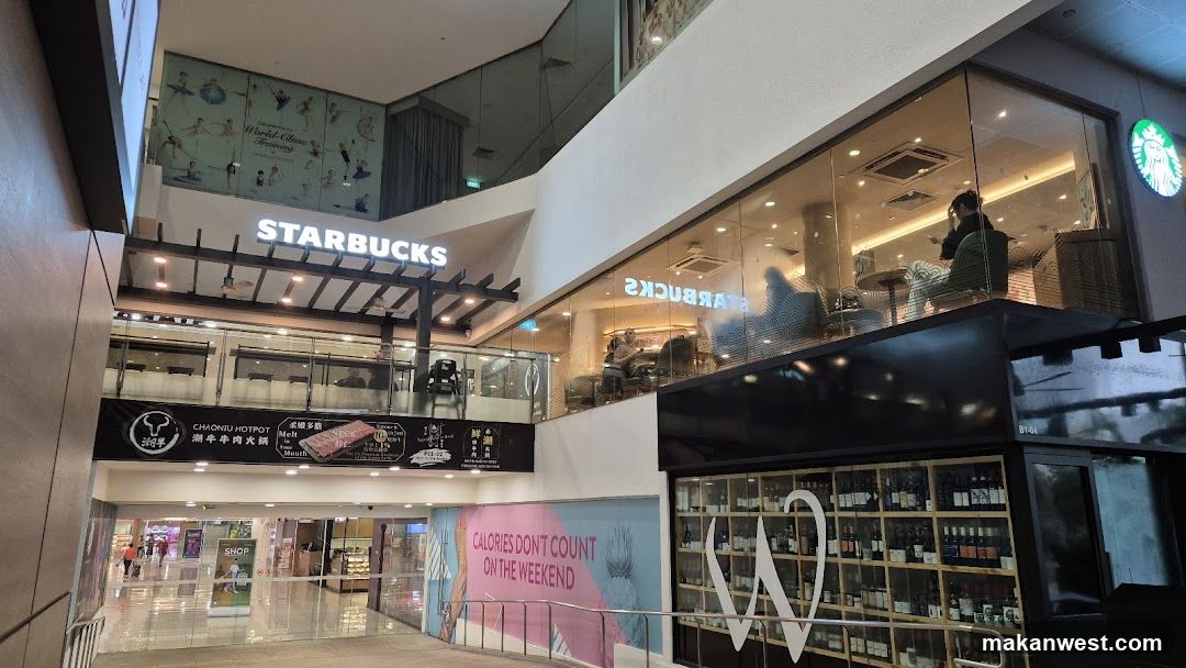Shopping Mall Interior with Starbucks and Wine Shop