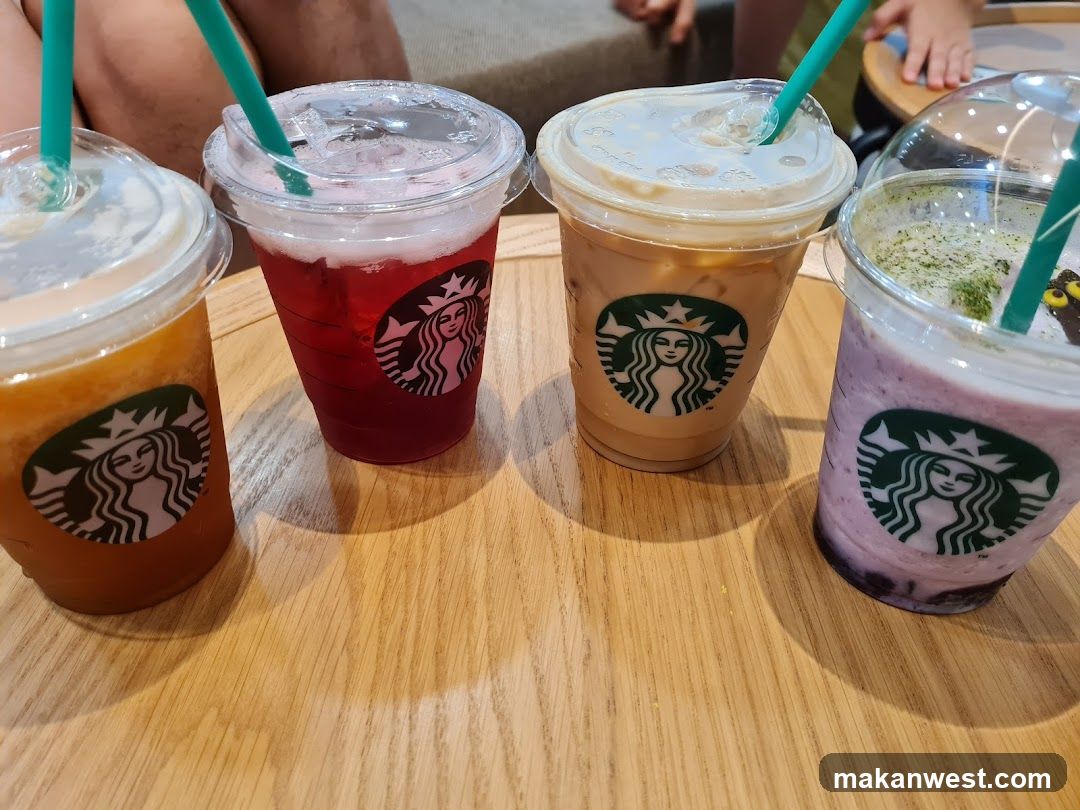 Starbucks Iced Drinks on Wooden Table