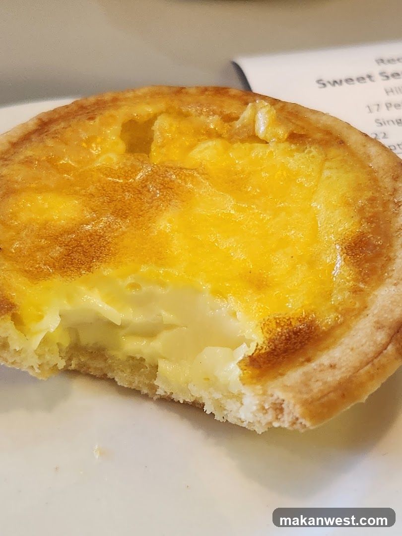 Egg Tart with Bite Taken