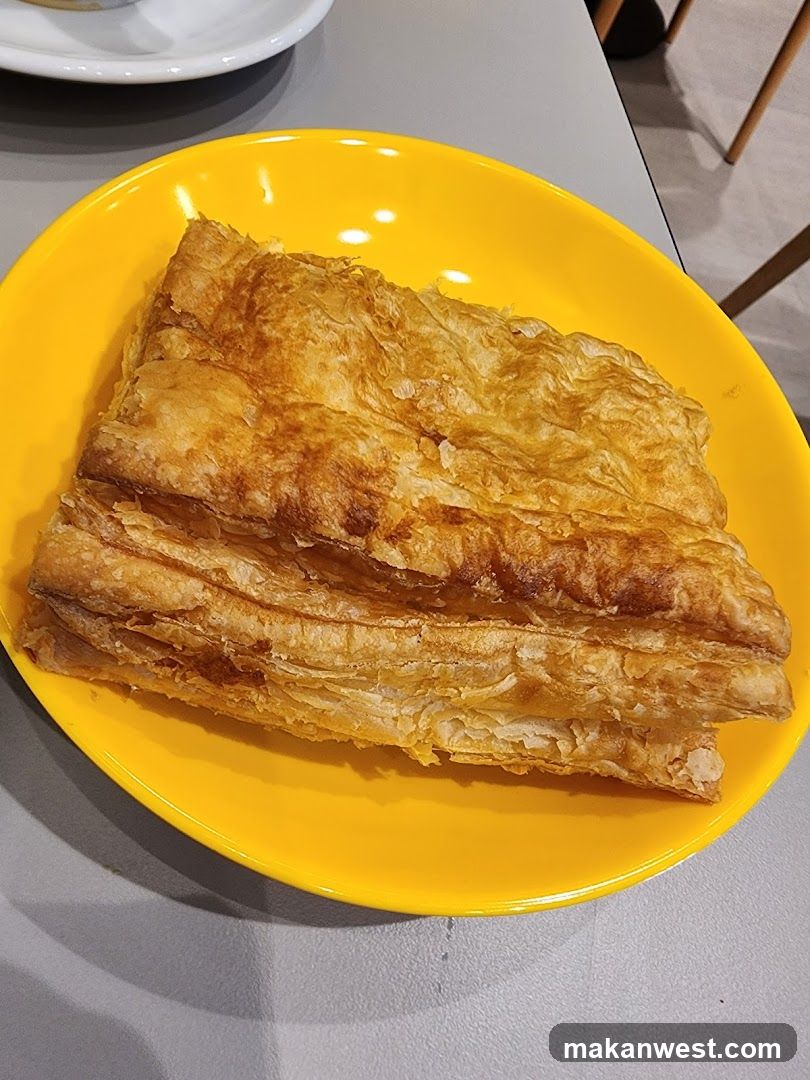 Layered Pastry on Yellow Plate