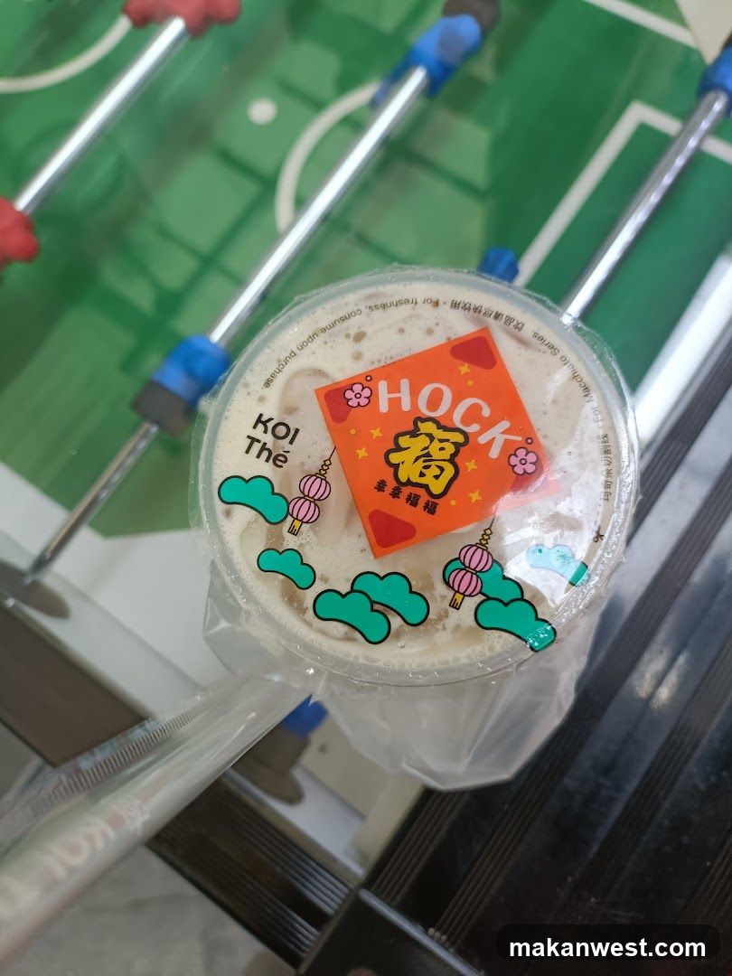 Foosball Table with Koi Thé Cup